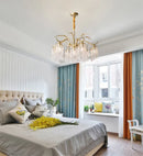 lustre suspendu en cristal et métal doré élégant