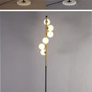 (16mai) Lampadaire moderne LED barre dorée avec globes en verre Inti