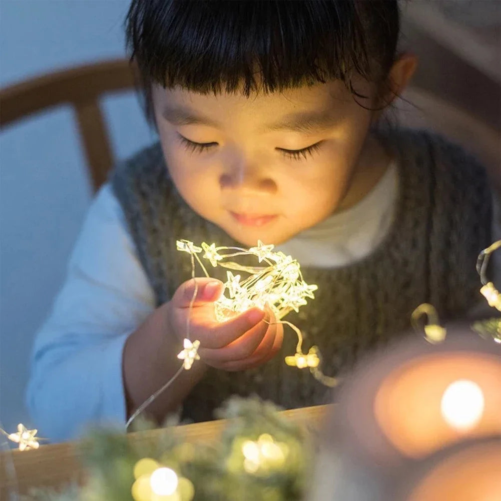 guirlande lumineuse en cuivre avec étoiles décoratives à piles - vue 5 sur 8