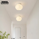 applique murale minimaliste citrouille style crème moderne
