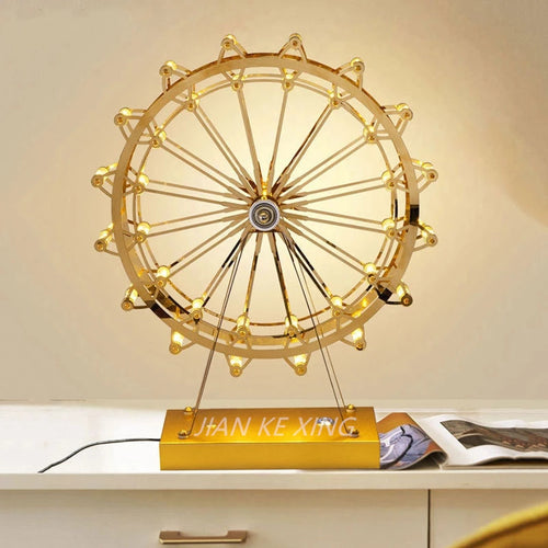 lampe de table rotative led grande roue en acier inoxydable - vue 2 sur 11