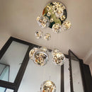 lustre moderne en colimaçon avec éclairage led et boule de cristal