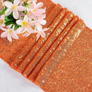 Chemin de table orange à paillettes décoration fêtes