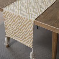 Chemin de table jacquard géométrique beige à pompons