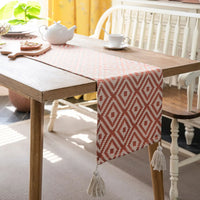 Chemin de table géométrique bohème beige à pompons