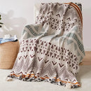 plaid tricoté bohème à rayures avec pompons doux