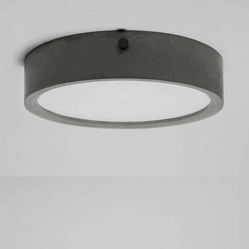 Plafonnier rond en ciment pour salon