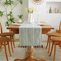 Chemin de table bohème brodé à pompons tissés