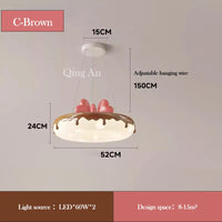 lustre en forme de donut avec nœud rose pour décoration enfantine