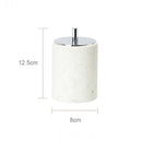 ensemble daccessoires en travertin beige pour salle de bain