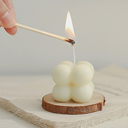 petite bougie parfumée en mini cube pour décorations festives - vue 2 sur 11
