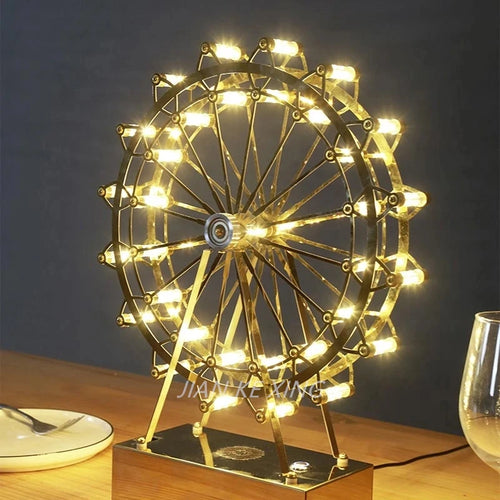 lampe de table rotative led grande roue en acier inoxydable - vue 4 sur 11