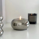 lustre moderne en céramique argentée avec bougies décoratives
