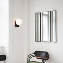 applique murale minimaliste en métal avec ampoule en verre