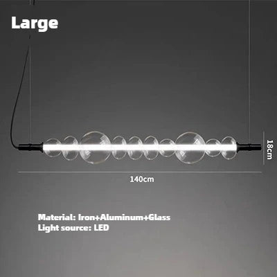 comptoir de bar moderne en verre avec éclairage suspendu minimaliste