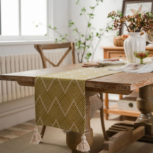 Chemin de table géométrique beige noir à pompons