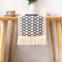 Chemin de table bohème géométrique beige à pompons