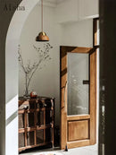 suspension en bois de noyer style wabi-sabi vintage en laiton japonais