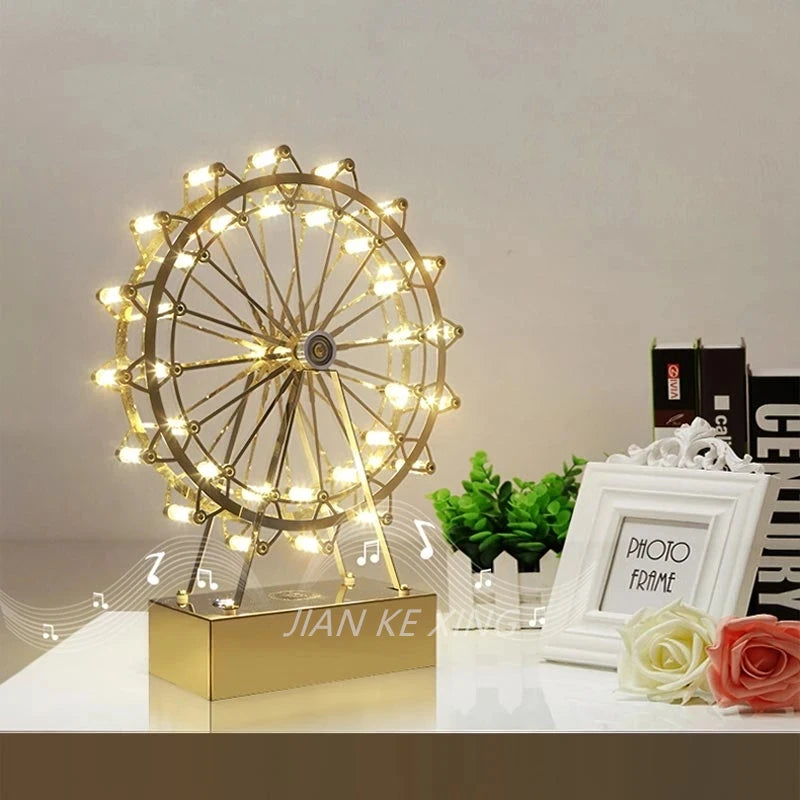 lampe de table rotative led grande roue en acier inoxydable - vue 3 sur 11