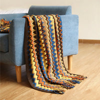 plaid boheme tisse a carreaux avec pompons doux