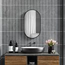 miroir ovale avec cadre en aluminium noir pour décoration intérieure