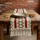 Chemin de table bohème motif aztèque à pompons