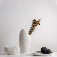 vase en résine avec texture corail pour décoration moderne