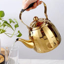 Bouilloire inox motif fleur infuseur amovible poignée isolante