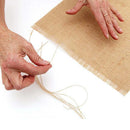 Chemin de table jute rustique avec pompons tresse