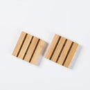 porte-savon en bambou créatif avec huiles essentielles et drainage