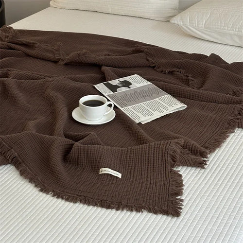 Plaid coton doux a carreaux avec pompons salon