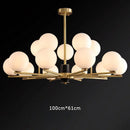 suspension nordique luxe en cuivre doré avec boules de verre blanches