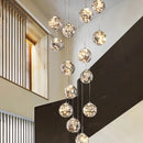 lustre moderne en colimaçon avec éclairage led et boule de cristal