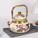 bouilloire vintage en émail motif floral poignée dorée