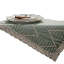 Chemin de table jacquard géométrique beige à pompons