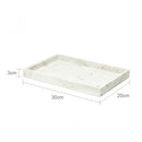 ensemble daccessoires en travertin beige pour salle de bain