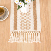 Chemin de table bohème géométrique beige avec pompons