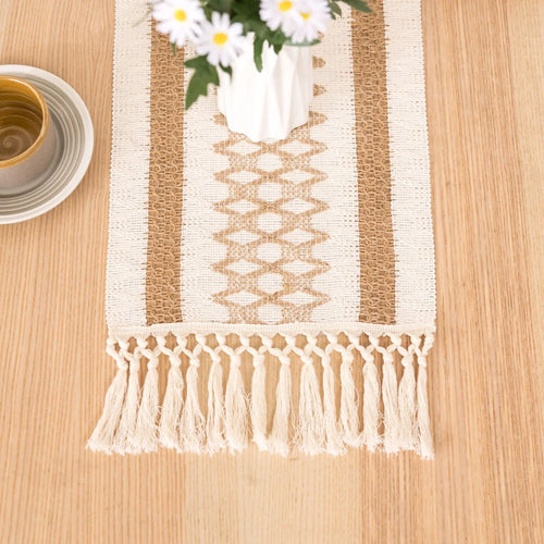 Chemin de table bohème géométrique beige avec pompons