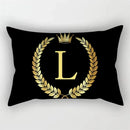 housse de coussin décorative motif lettres noires et dorées