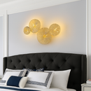 Applique murale design LED avec plusieurs disques doré ou cuivré style fleurs