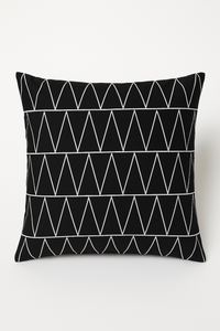 housse de coussin géométrique noire et blanche élégante