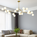 lustre moderne led avec branches d'arbre et boules de verre