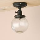 Plafonnier vintage industriel avec boule en verre