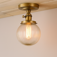 Plafonnier vintage industriel avec boule en verre