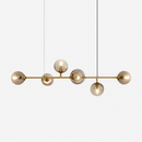 Suspension design LED allongée avec plusieurs abats-jour métal