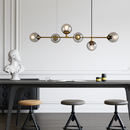 Suspension design LED allongée avec plusieurs abats-jour métal