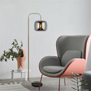 Lampadaire design avec boule en verre fumé Stone