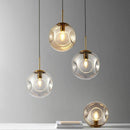Suspension design boule déformées en verre fumé Ball