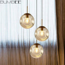 Suspension design boule déformées en verre fumé Ball