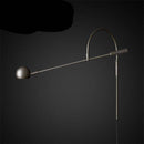Applique murale design à LED dorée et tige métal arrondie Shake